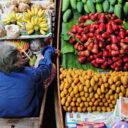 Local fruits and coconut sugar for sale on a boat at Damnoen Saduak floating market