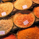 Dried shrimps of different sizes, tastes, and colors at the famous Railway market in Samut Songkram